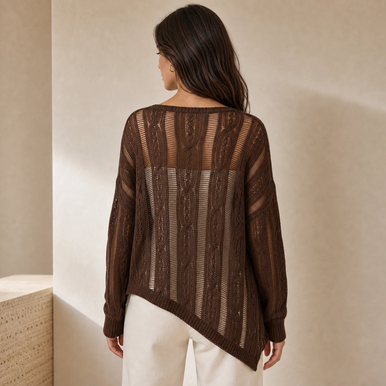 Women's openwork knitted sweater